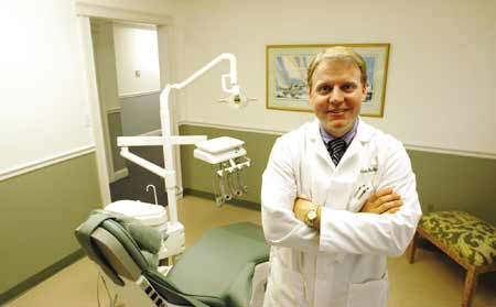 Dentist Dr. Barton McGirl in his new Hampton office