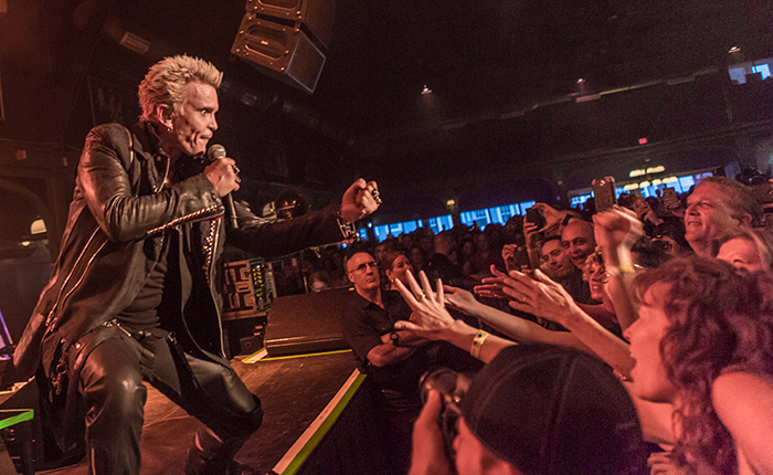 Music fans get so close to rocker Billy Idol they can almost touch him