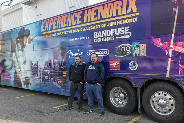 Dale (left) and his son Dale Jr. hang out by the Jimi Hendrix Experience tour bus in the Casino parking lot
