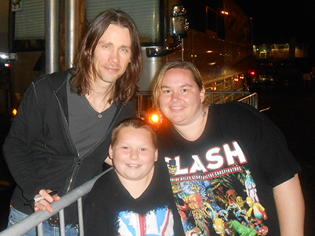 JJ Whitten shares a moment with his mother Sue and singer Myles Kennedy, who often accompanies Slash on tour.