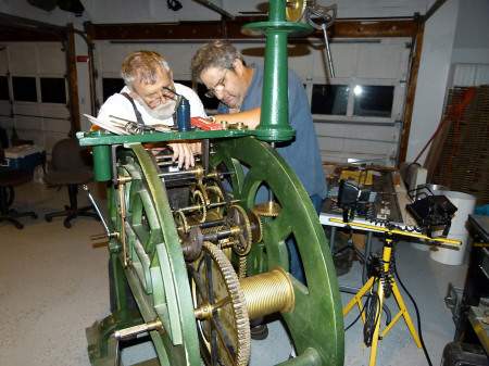 Cliff Pratt and Harvey Webber restoring the old town clock