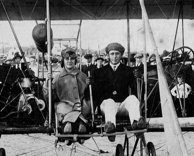 Perhaps the last photograph of Massachusetts aviator J. Chauncey Redding who was killed in an airplane crash a month later. With Carnival Queen Blanche Thompson at Hampton Beach, September 1915.