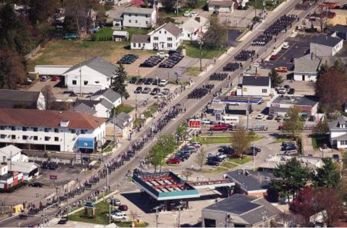 Maloney Funeral procession aerial view of marchers